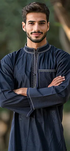 Man wearing an Al-Dar Apparel Blue Evening Thobe with White Accents