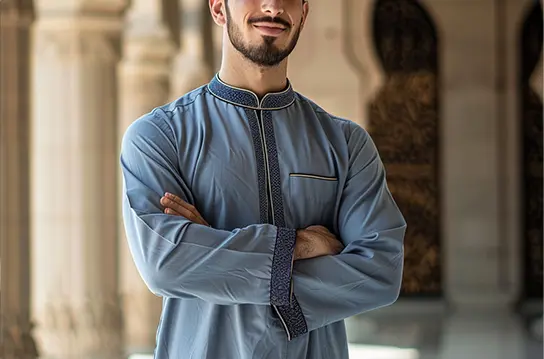 Man wearing blue evening thobe